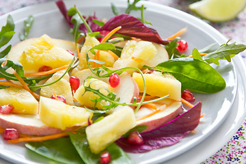 Image showing Pineapple with pomegranate and spinach salad