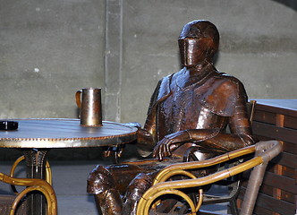 Image showing armour having a beer