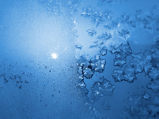 Image showing Ice pattern and sunlight on winter glass