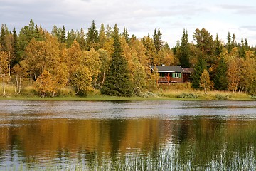 Image showing Cottage by lake