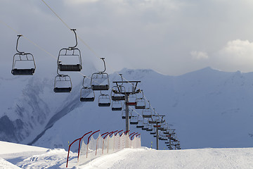 Image showing Snow skiing piste and ropeway