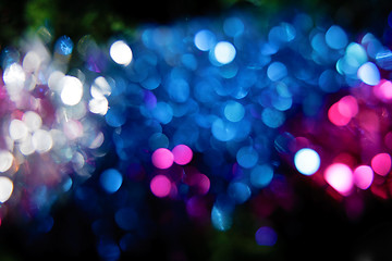 Image showing festive background. blurred reflections