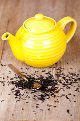 Image showing teapot with spoon and tea