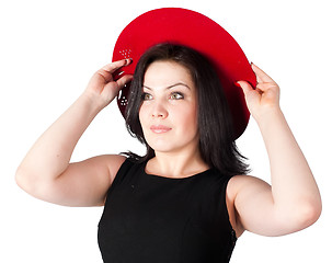 Image showing young beautiful woman with red hat