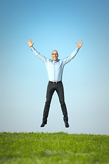 Image showing happy jumping man