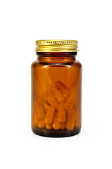 Image showing Capsules in a brown jar