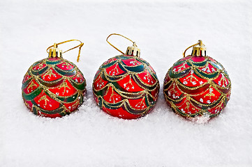 Image showing Christmas red balls in the snow