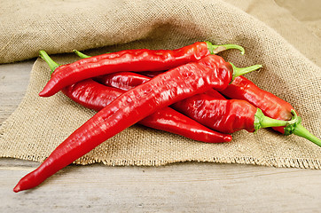 Image showing Peppers hot red on sacking