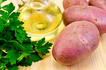 Image showing Potatoes red with parsley and oil