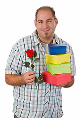 Image showing Man with gifts and rose
