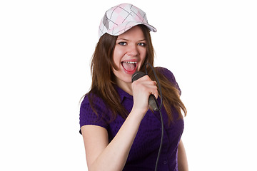 Image showing Woman with cap singing