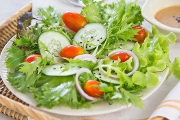 Image showing Healthy salad with sesame dressing
