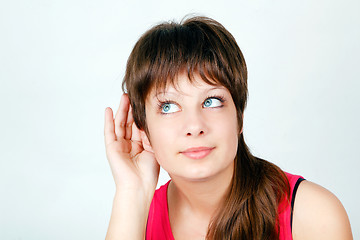 Image showing attractive girl listening