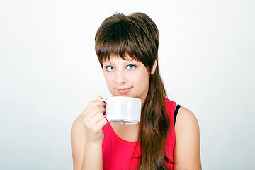 Image showing girl with a big white mug