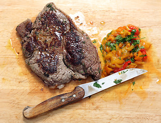 Image showing Pan seared steak and pickled peppers