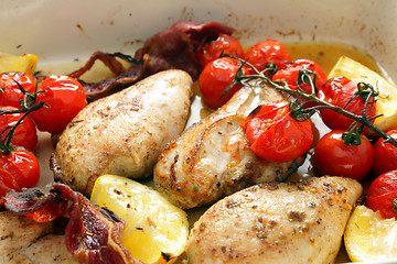 Image showing Baked chicken lemon and tomatoes