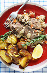 Image showing Kleftiko and roast potatoes from above