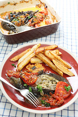 Image showing Eggplant with onions and tomato vertical