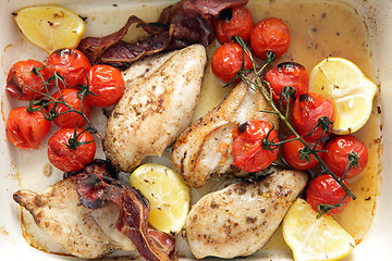 Image showing High angle grilled chicken and tomatoes