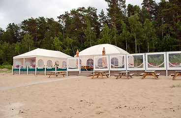 Image showing Restaurant bar tents on seaside sand 