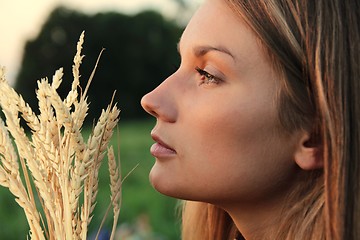 Image showing Attractive Woman with wheat spikes