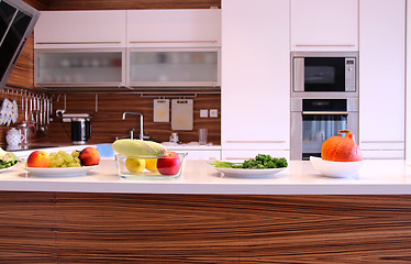 Image showing Fruit and vegetables in the well designed modern kitchen 