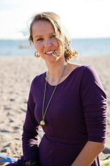 Image showing Happy smiling woman at beach.
