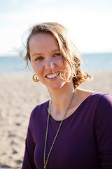 Image showing Happy smiling woman at beach.