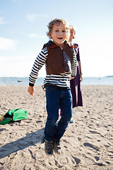 Image showing Boy jumping at beach