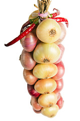 Image showing Sheaf of an onions, it is isolated on white