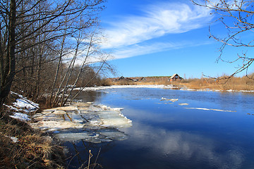 Image showing rural house on coast autumn river