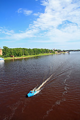 Image showing boat sails on broad river