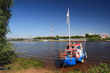 Image showing old motorboat on river coast