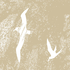 Image showing birds silhouette on brown background