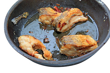 Image showing roasted fish on black griddle