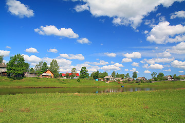 Image showing small village on river coast