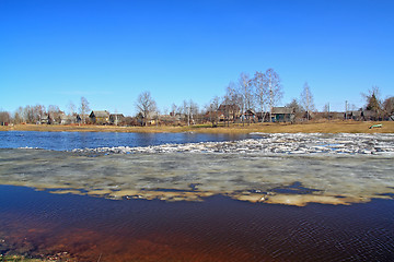 Image showing village on coast autumn river