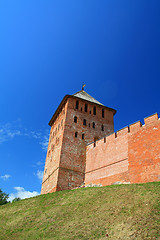 Image showing aging fortress amongst green herb 