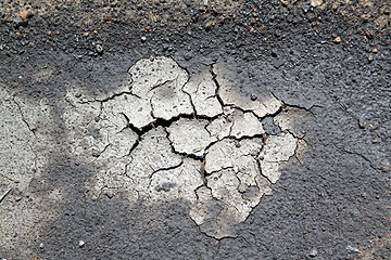 Image showing deep rifts on dry land