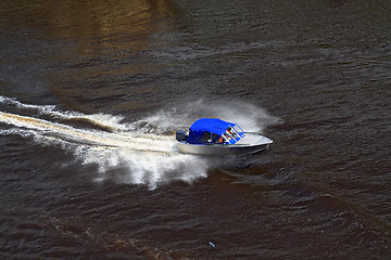 Image showing boat sails on broad river