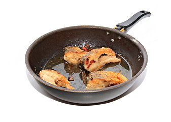 Image showing roasted fish on black griddle