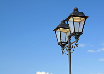 Image showing town torch on blue background