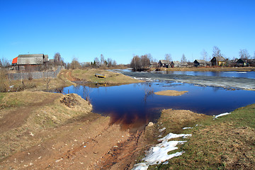 Image showing village on coast autumn river