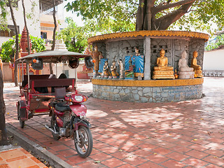 Image showing Tuk-tuk taxi at temple in Phnom Penh