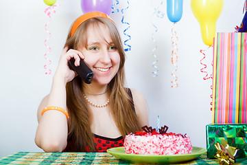 Image showing Birthday of a young girl. telephone conversation