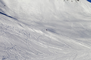 Image showing Snowboarder on ski piste