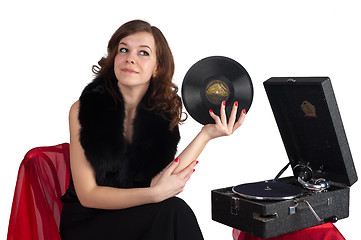 Image showing Pretty woman with gramophone