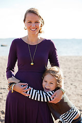 Image showing Mother and son at beach.