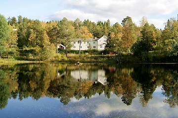 Image showing Villa by a dam