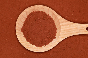 Image showing Cocoa on a wooden spoon